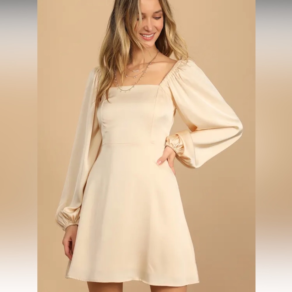 Lulu’s So Darling Light Peach Satin Long Sleeve
Tie-Back Mini Dress